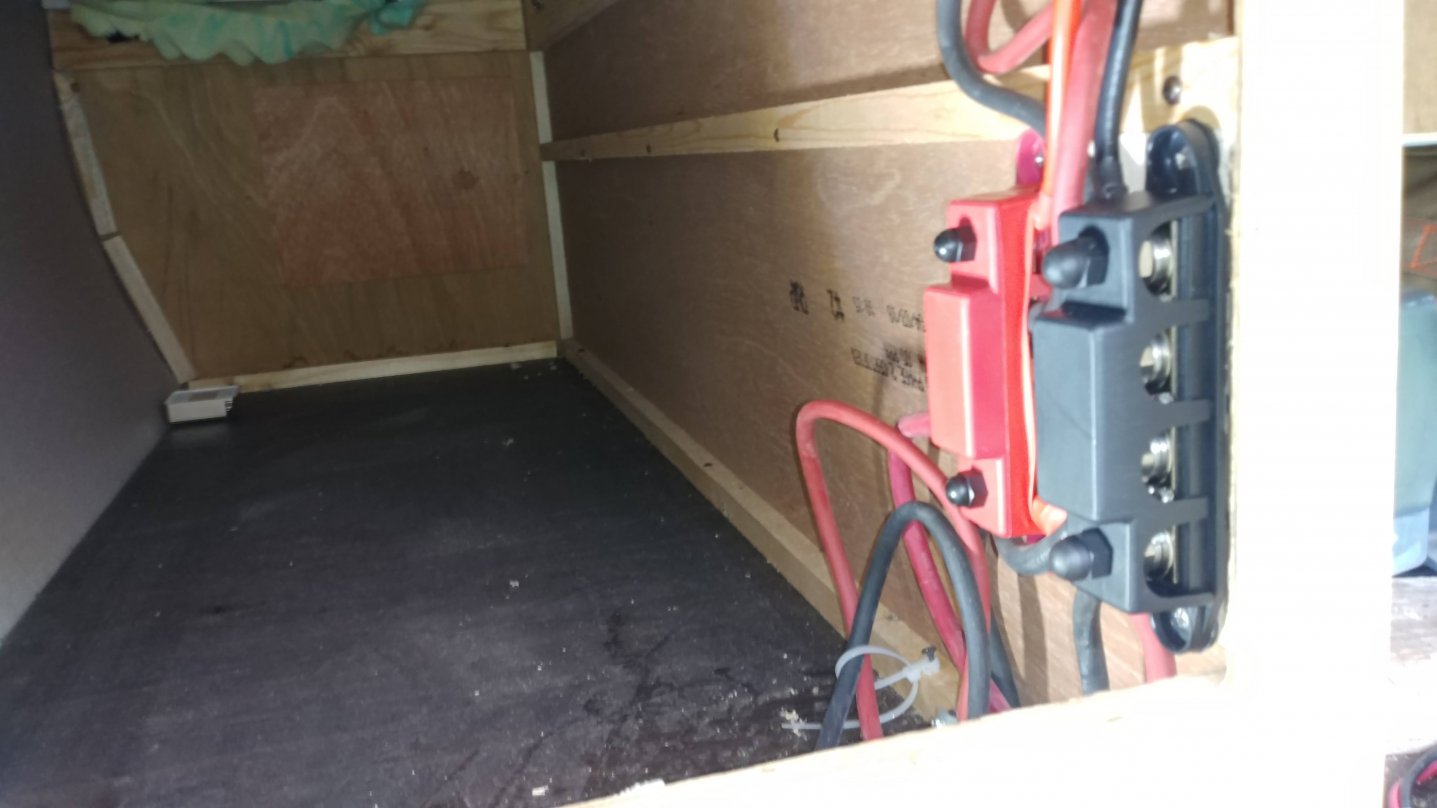 This is the access bay under the murphy bed, and is an excellent spot for the wiring.  Newer 2108DS model murphy beds do not tip into a bay like this, so another spot for terminal blocks would need to be found.